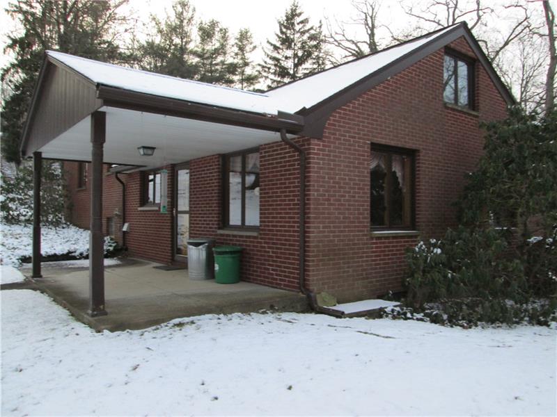 148 Thompson Road Beaver Falls, PA 15010 - Photo 5 of 25 Delightful sitting and rocking chair porch just off kitchen.