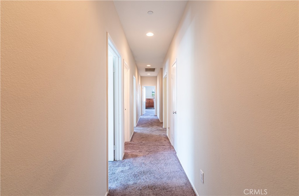 1864 Image Meadows San Jacinto, CA 92582 - Photo 33 of 46 a view of a hallway with a white walls