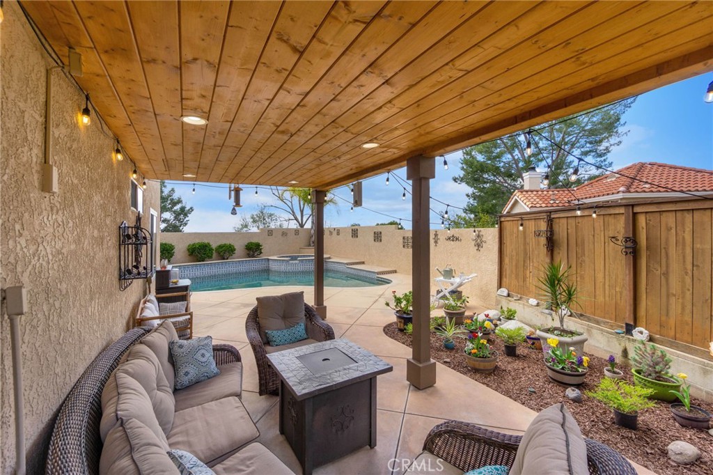Backyard Entertaining -
Pool, covered patio, and outdoor kitchen, bbq area