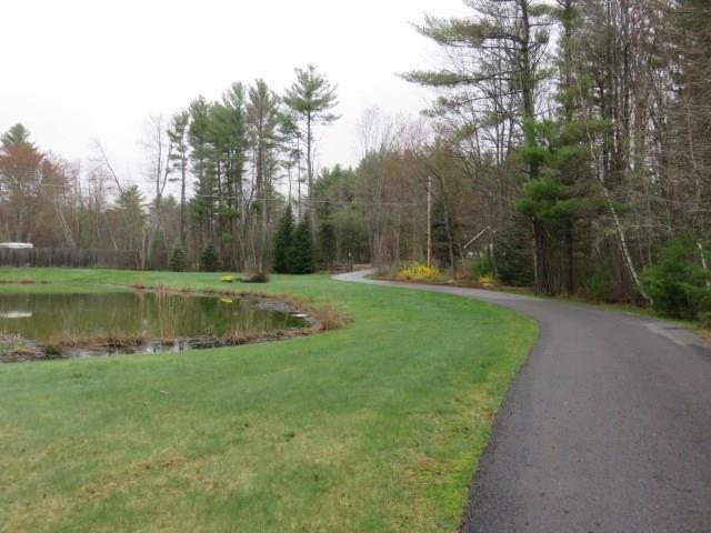 90 Little River Road Lebanon, ME 04027 - Photo 5 of 34 The winding driveway was paved a few...