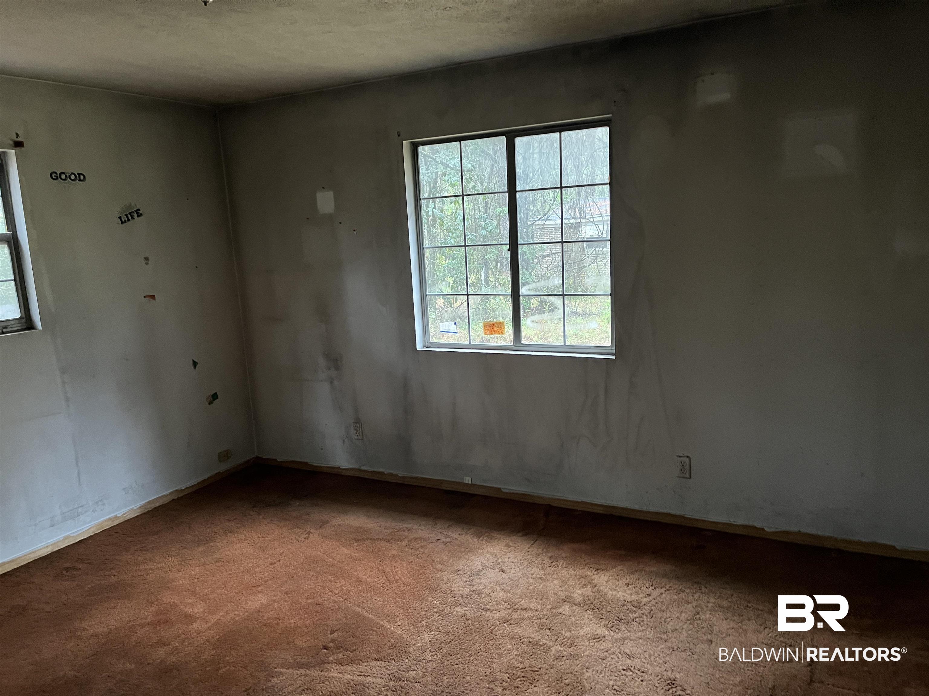 127 Moore Street Brewton, AL 36426 - Photo 14 of 15 View of carpeted empty room