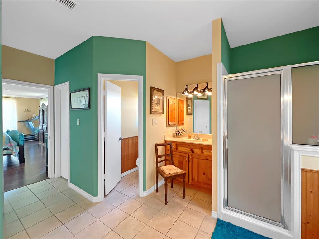 590 County Road 385 Valley View, TX 76272 - Photo 19 of 38 a view of bathroom with a sink and a mirror