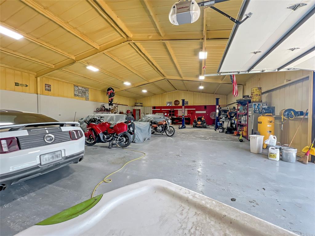 590 County Road 385 Valley View, TX 76272 - Photo 27 of 38 a view of a garage with storage