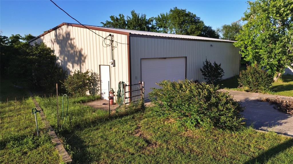 590 County Road 385 Valley View, TX 76272 - Photo 32 of 38 a view of a backyard with plants