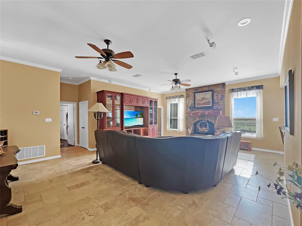 590 County Road 385 Valley View, TX 76272 - Photo 9 of 38 a living room with furniture and a wooden floor
