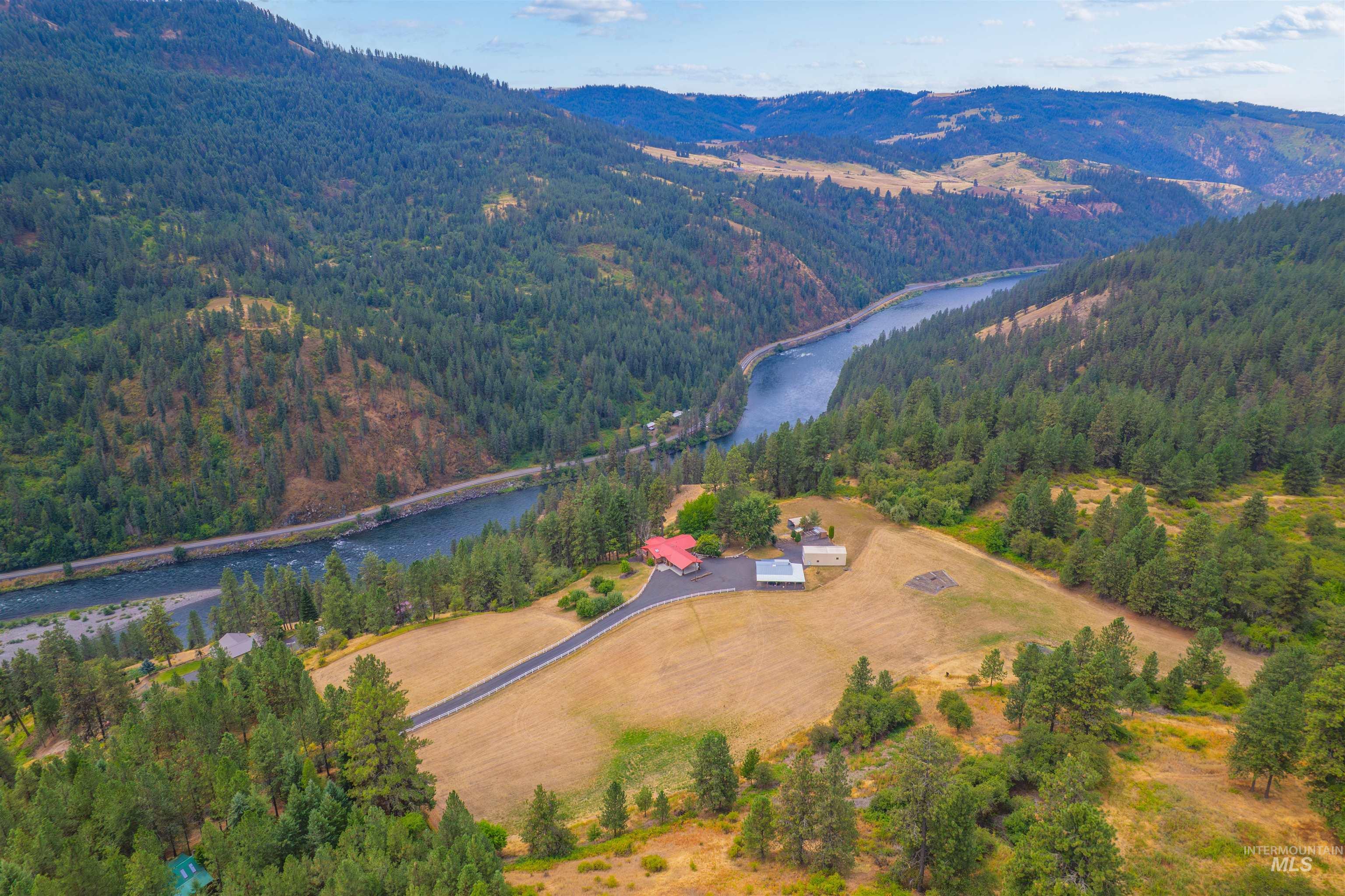 211 Ridge View Drive Lenore, ID 83541 - Photo 1 of 1 Aerial overview of property's location featuring a water and mountain view