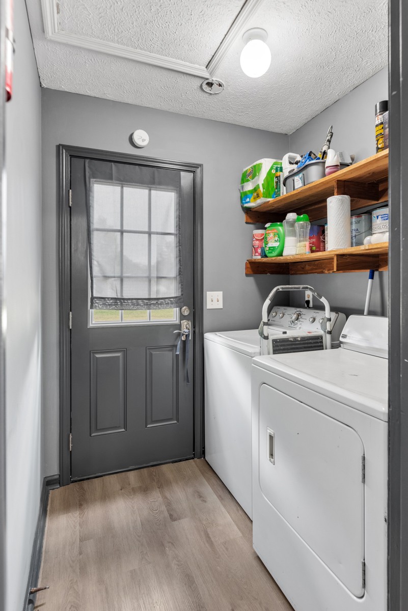 560 Gregory Road Westmoreland, TN 37186 - Photo 23 of 41 a utility room with dryer and washer