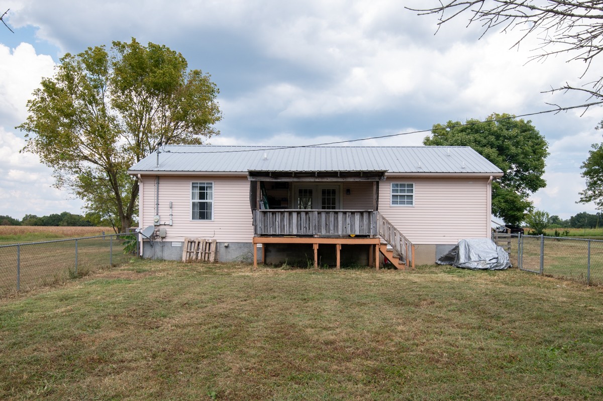 560 Gregory Road Westmoreland, TN 37186 - Photo 31 of 41 a view of a house with backyard and sitting area