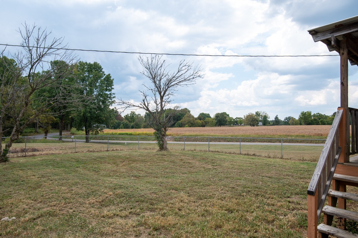560 Gregory Road Westmoreland, TN 37186 - Photo 34 of 41 a view of a lake with a yard