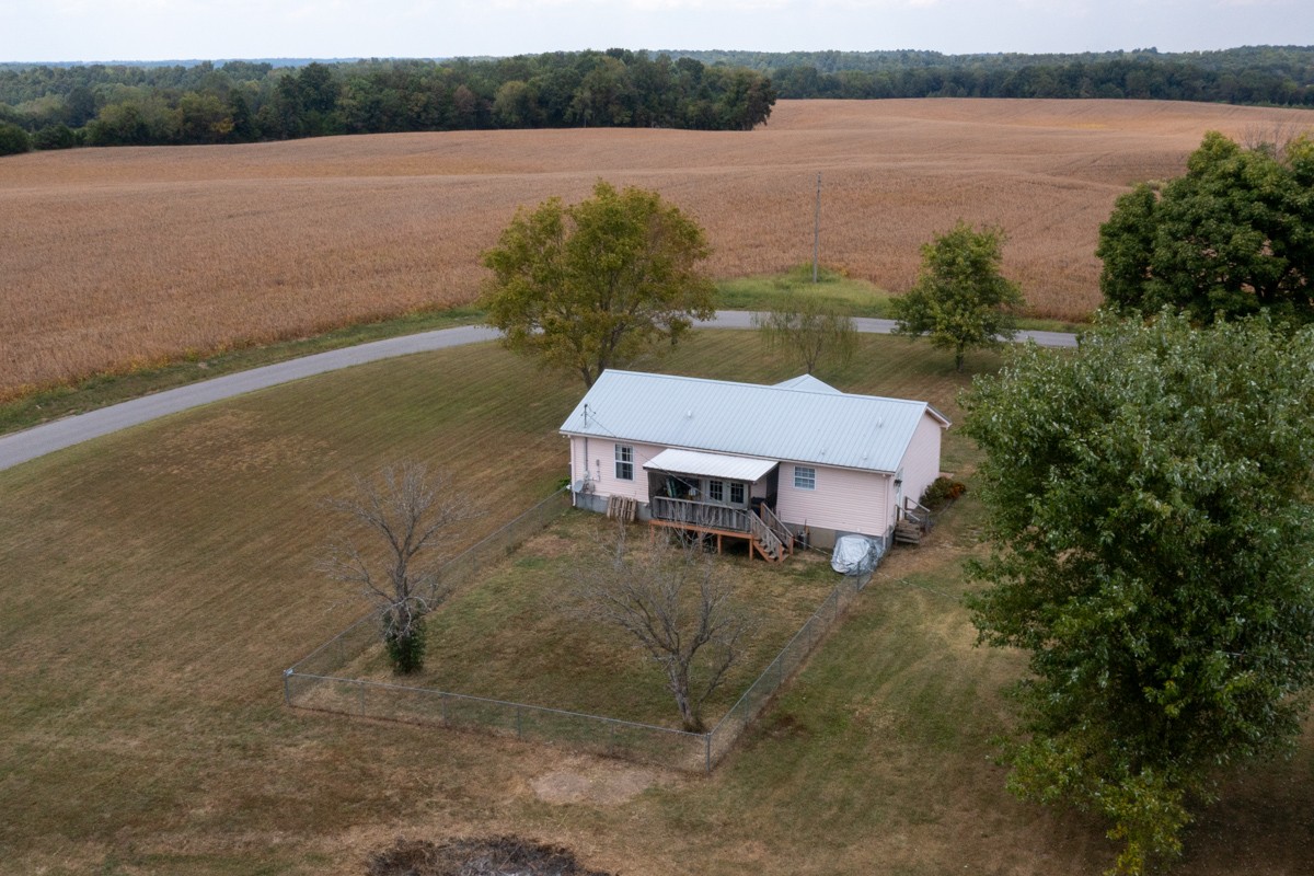 560 Gregory Road Westmoreland, TN 37186 - Photo 37 of 41 a swimming pool with lake view