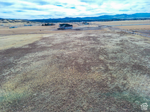 1630 North 900 East Beaver, UT 84713 - Photo 6 of 21 Aerial view of sparsely populated area with a mountain backdrop