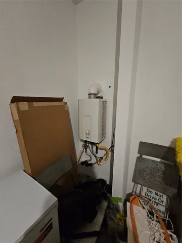 a room with furniture and a mirror