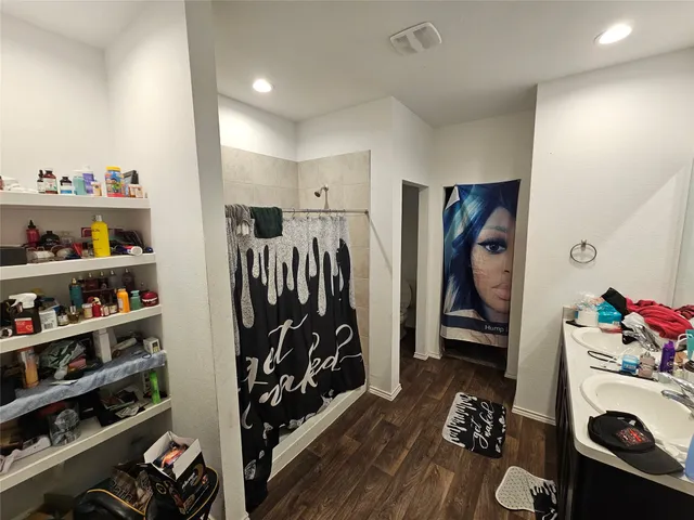 a view of a livingroom with furniture and closet