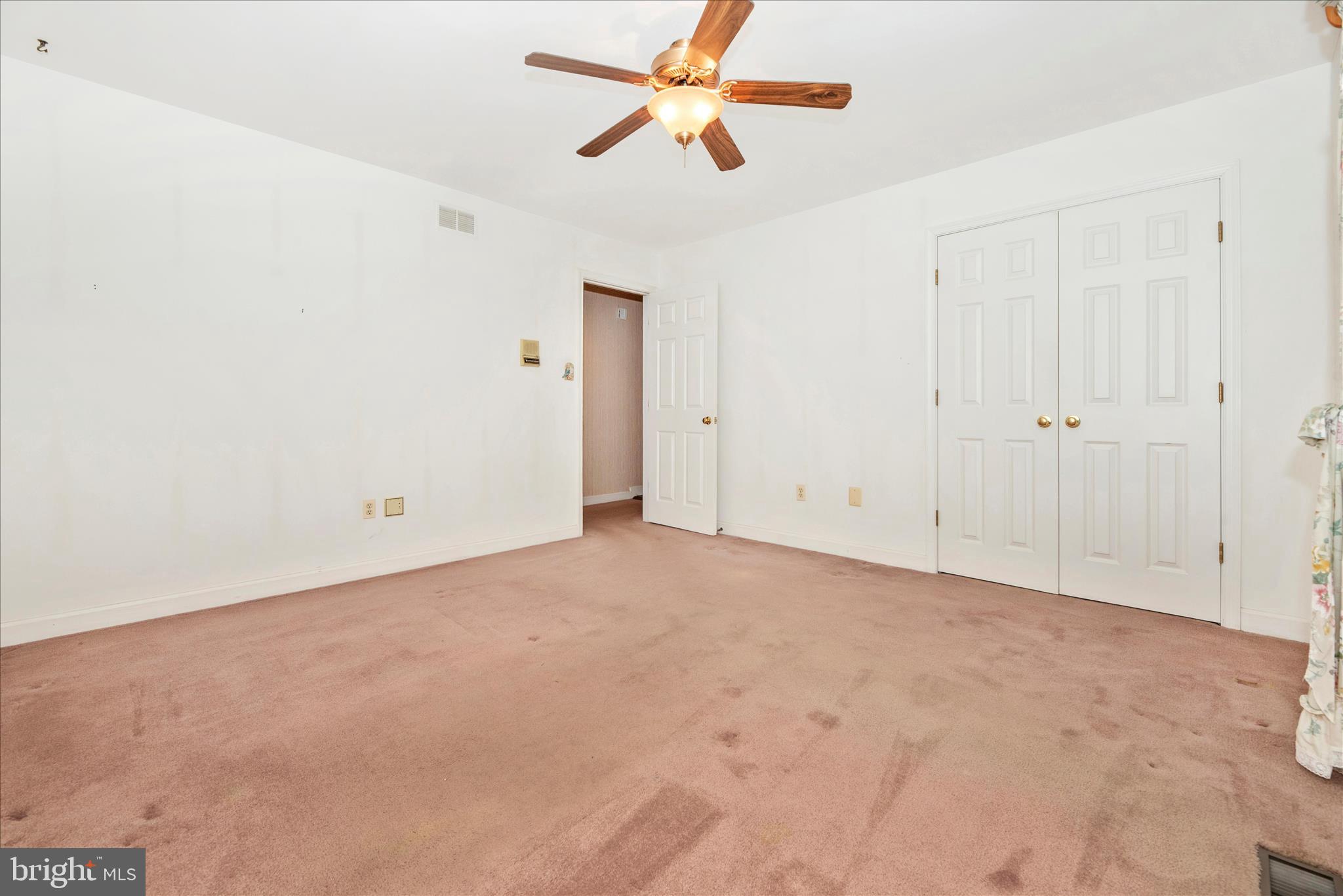 2221 Gold Mine Road Brookeville, MD 20833 - Photo 39 of 60 an empty room with chandelier fan