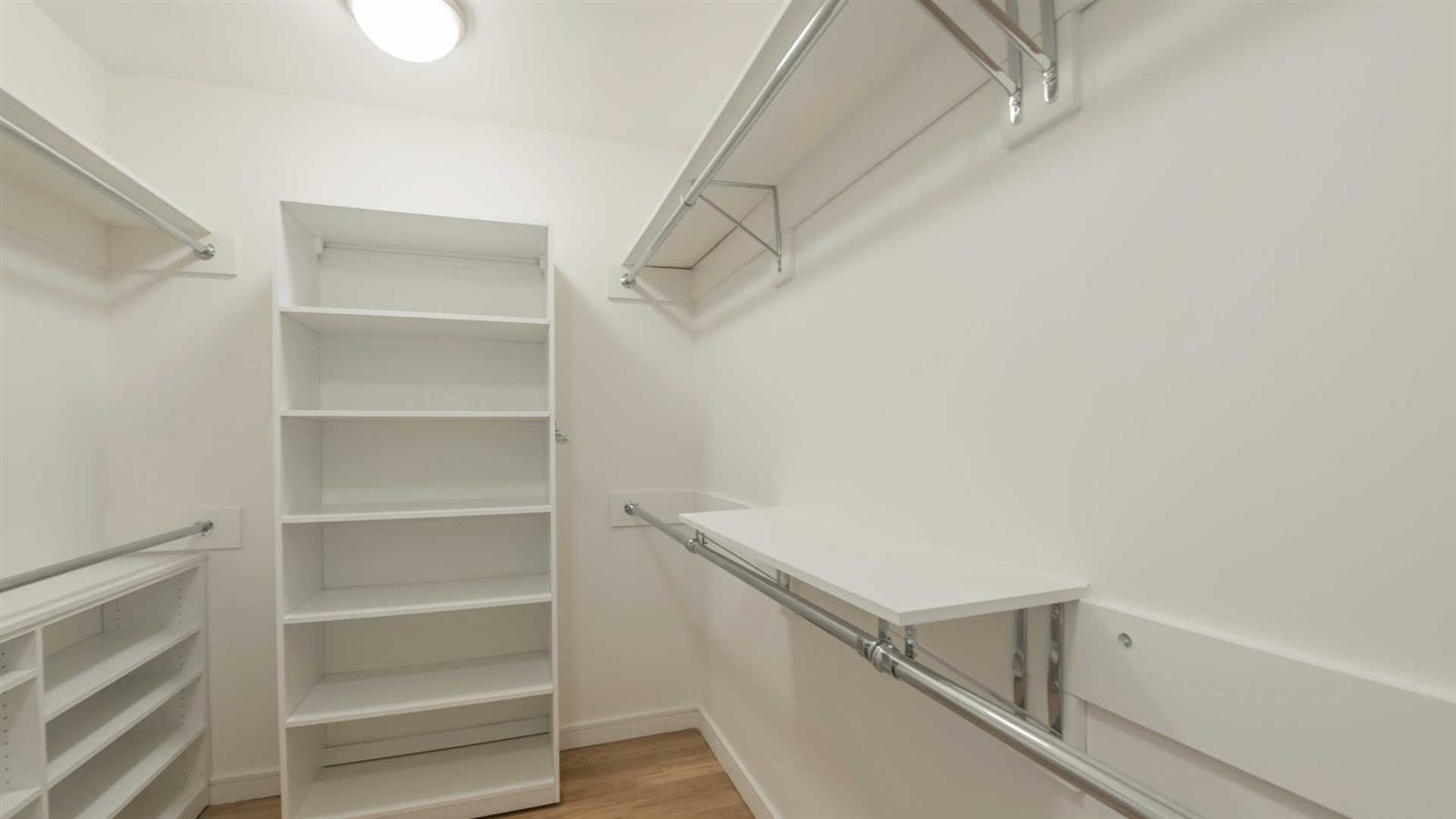 105 West 29th Street, Unit 35G Manhattan, NY 10001 - Photo 7 of 10 a view of an empty walk in closet