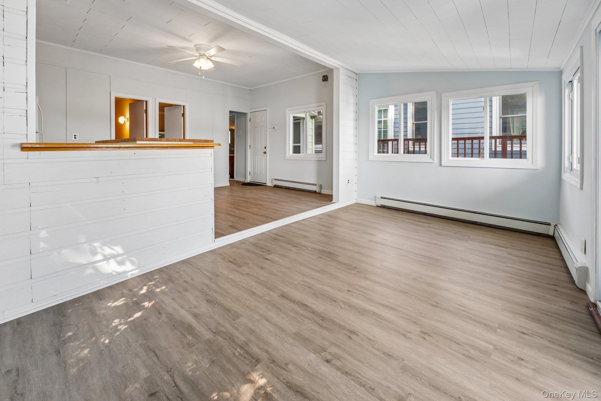 75-25 West Shore Road, Unit MAIN ST Port Washington, NY 11050 - Photo 4 of 26 Wall of Windows to the water