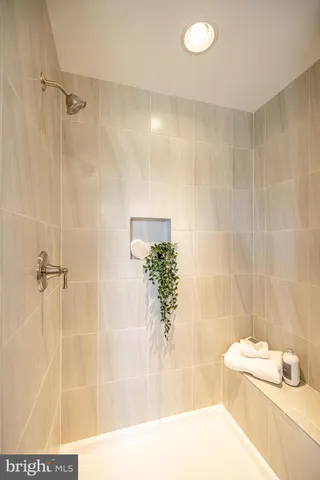 a bathroom with a sink and a shower