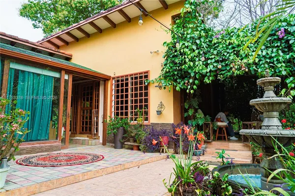 a vase of flowers sitting on a table