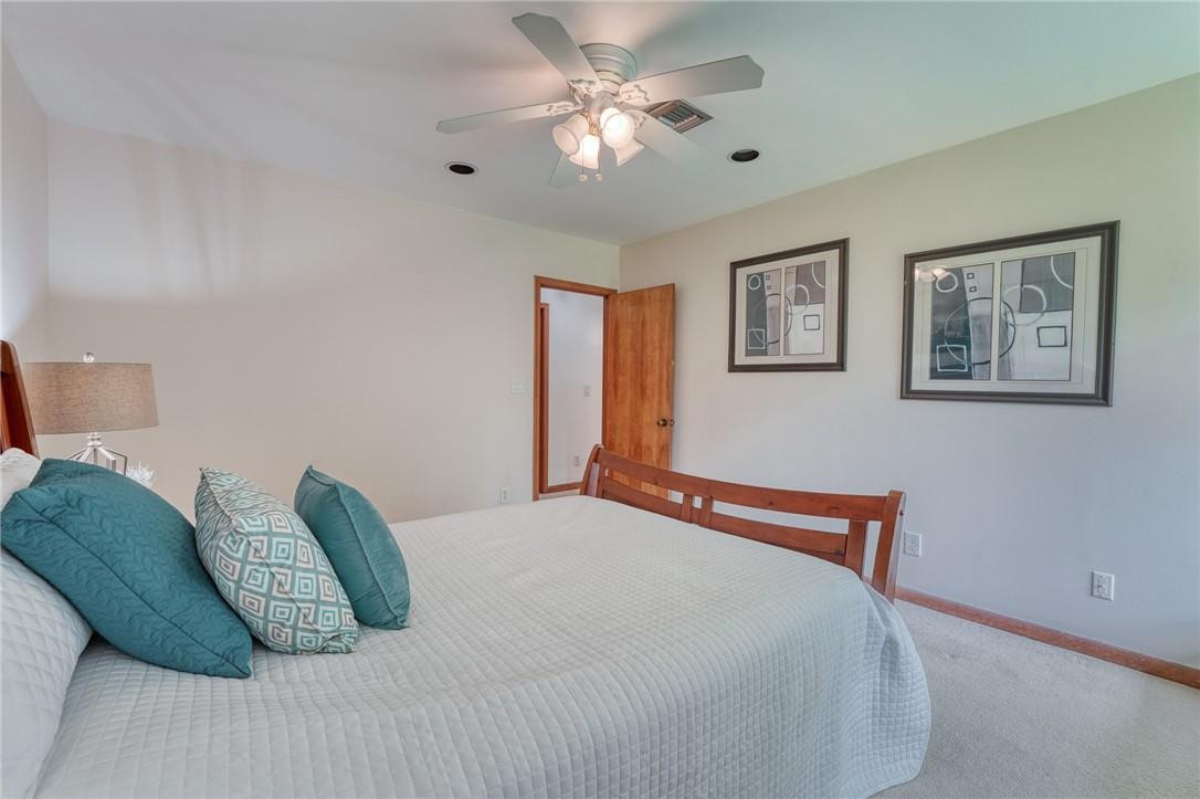 5901 Cypress Road Plantation, FL 33317 - Photo 15 of 99 a bedroom with a bed and a painting on the wall