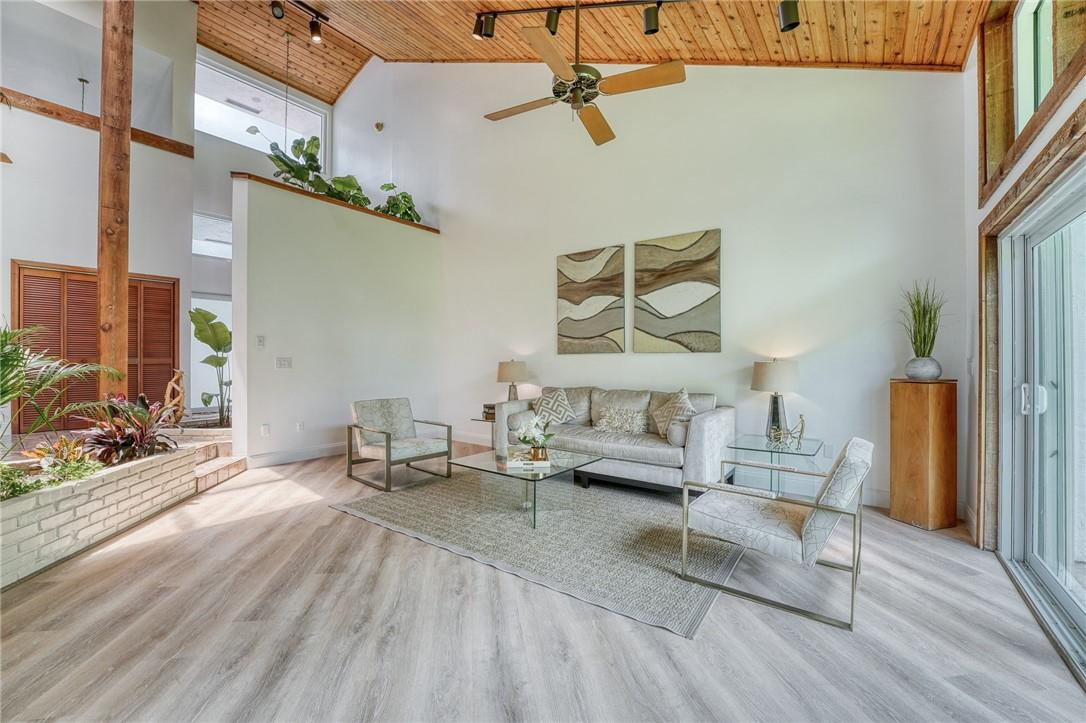 5901 Cypress Road Plantation, FL 33317 - Photo 34 of 99 a living room with furniture and a flat screen tv