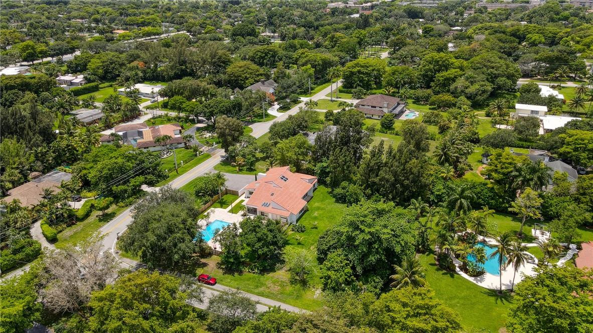 5901 Cypress Road Plantation, FL 33317 - Photo 4 of 99 an aerial view of residential house with outdoor space and trees all around