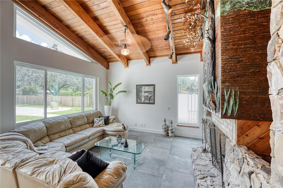 5901 Cypress Road Plantation, FL 33317 - Photo 48 of 99 a living room with furniture and a floor to ceiling window