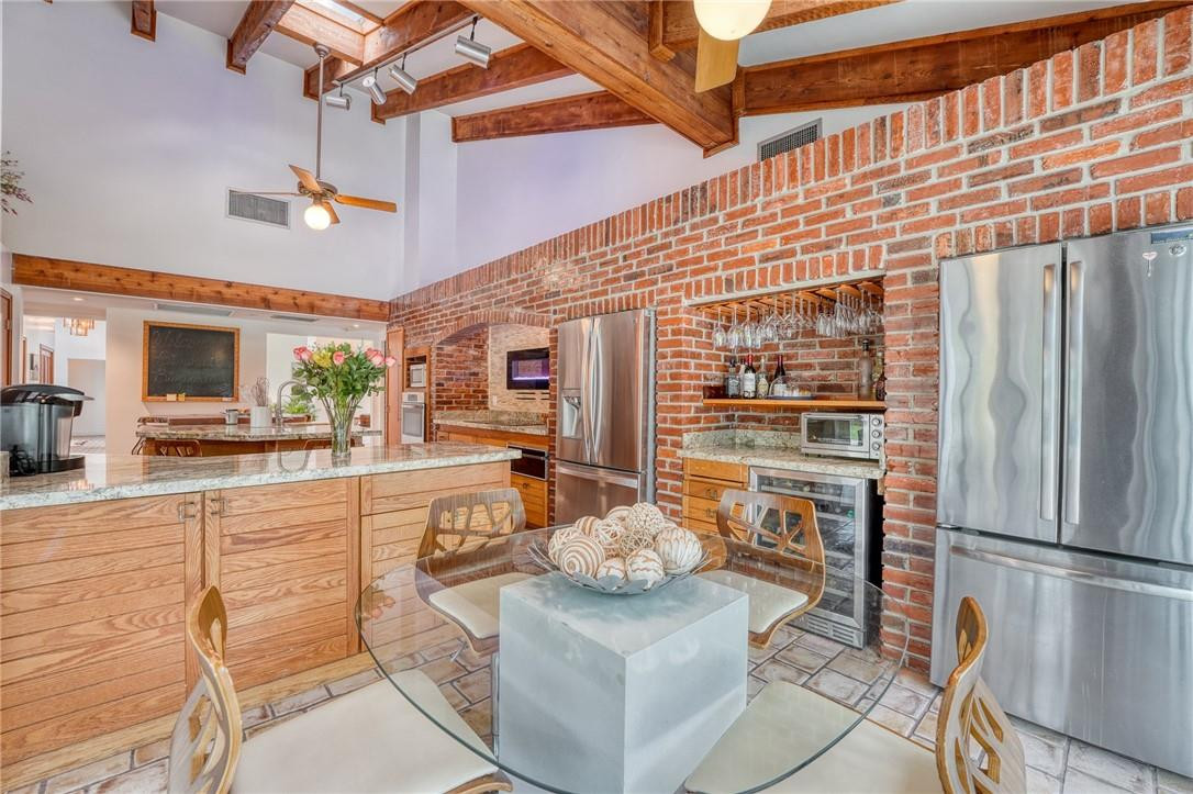 5901 Cypress Road Plantation, FL 33317 - Photo 60 of 99 a living room with furniture a table and chairs