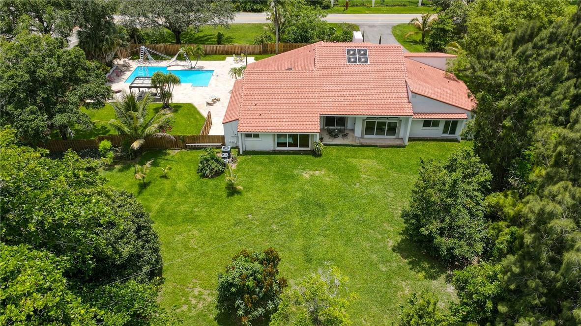 5901 Cypress Road Plantation, FL 33317 - Photo 7 of 99 a aerial view of a house with swimming pool and a yard