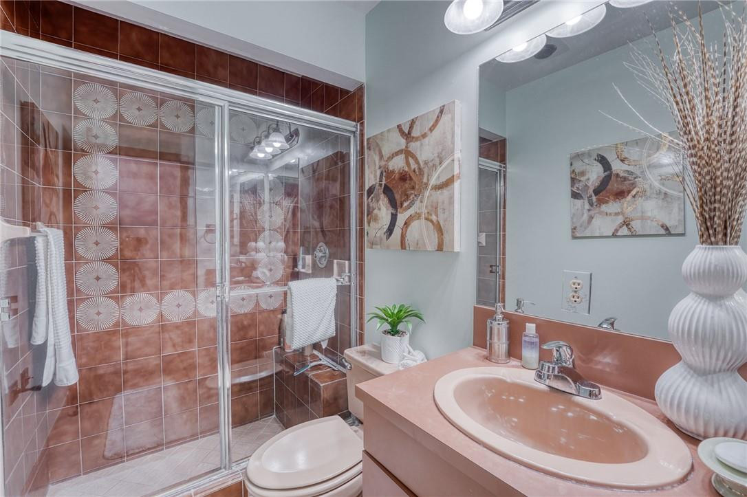 5901 Cypress Road Plantation, FL 33317 - Photo 9 of 99 a bathroom with a sink a toilet and shower curtain
