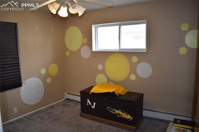 a room with a chandelier and a mirror