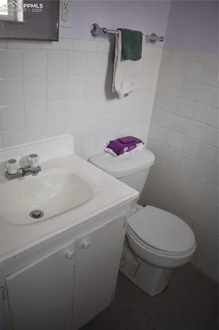 a bathroom with a sink and toilet