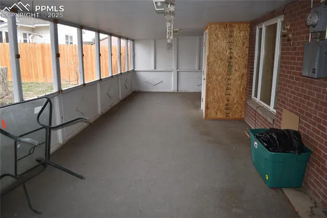 a view of an empty room and window