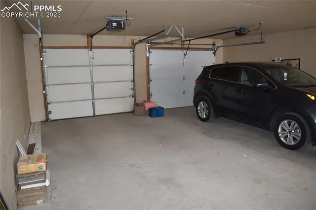 a view of a house with a yard covered with snow