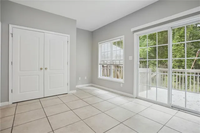 a view of an empty room and window