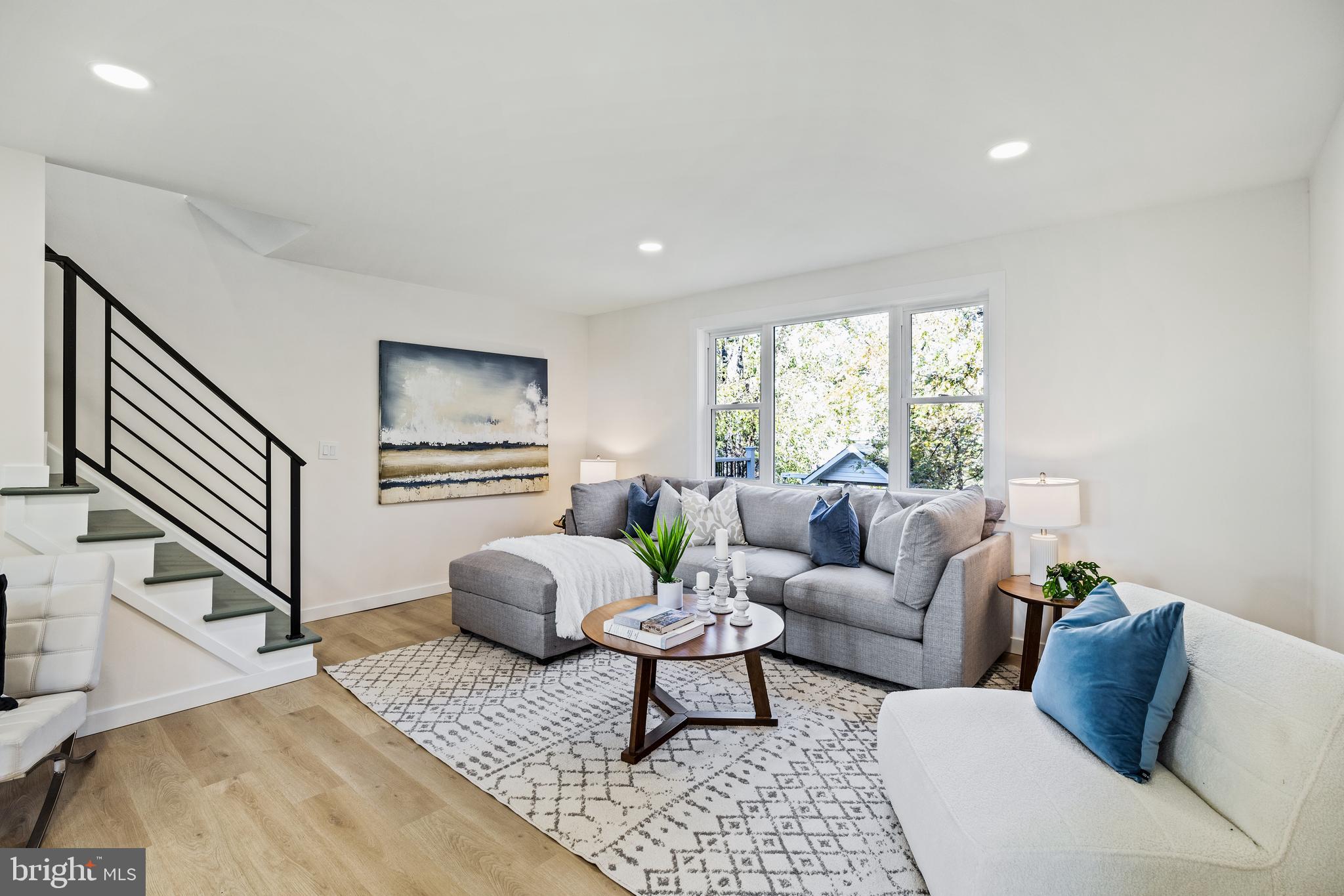859 Selmer Road Philadelphia, PA 19116 - Photo 11 of 47 a living room with furniture and a large window