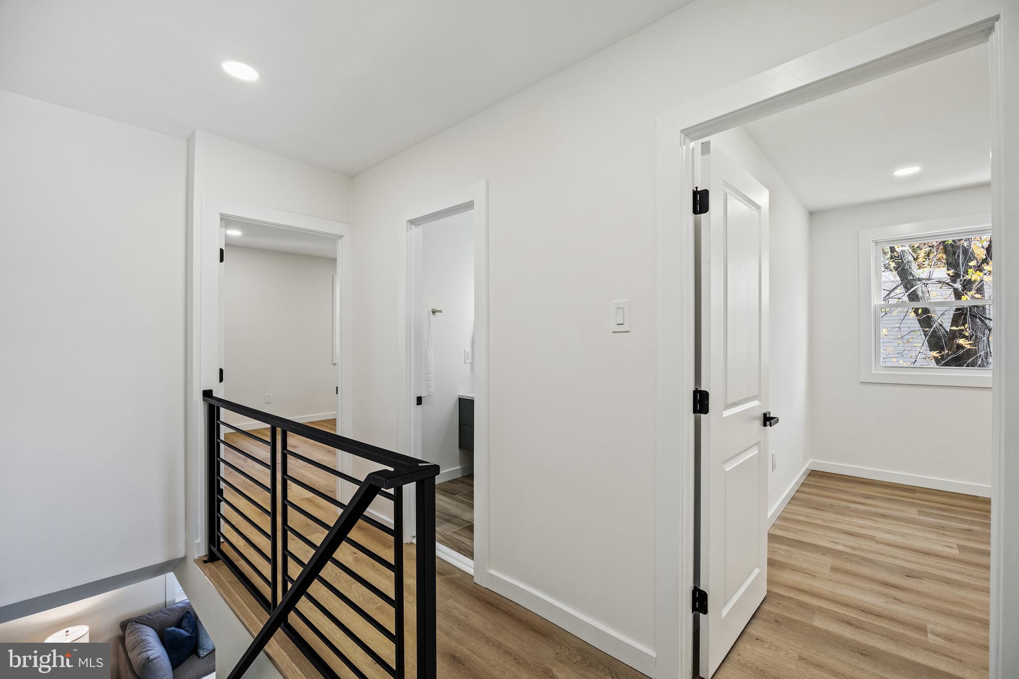 859 Selmer Road Philadelphia, PA 19116 - Photo 16 of 47 a view of a hallway with wooden floor and staircase