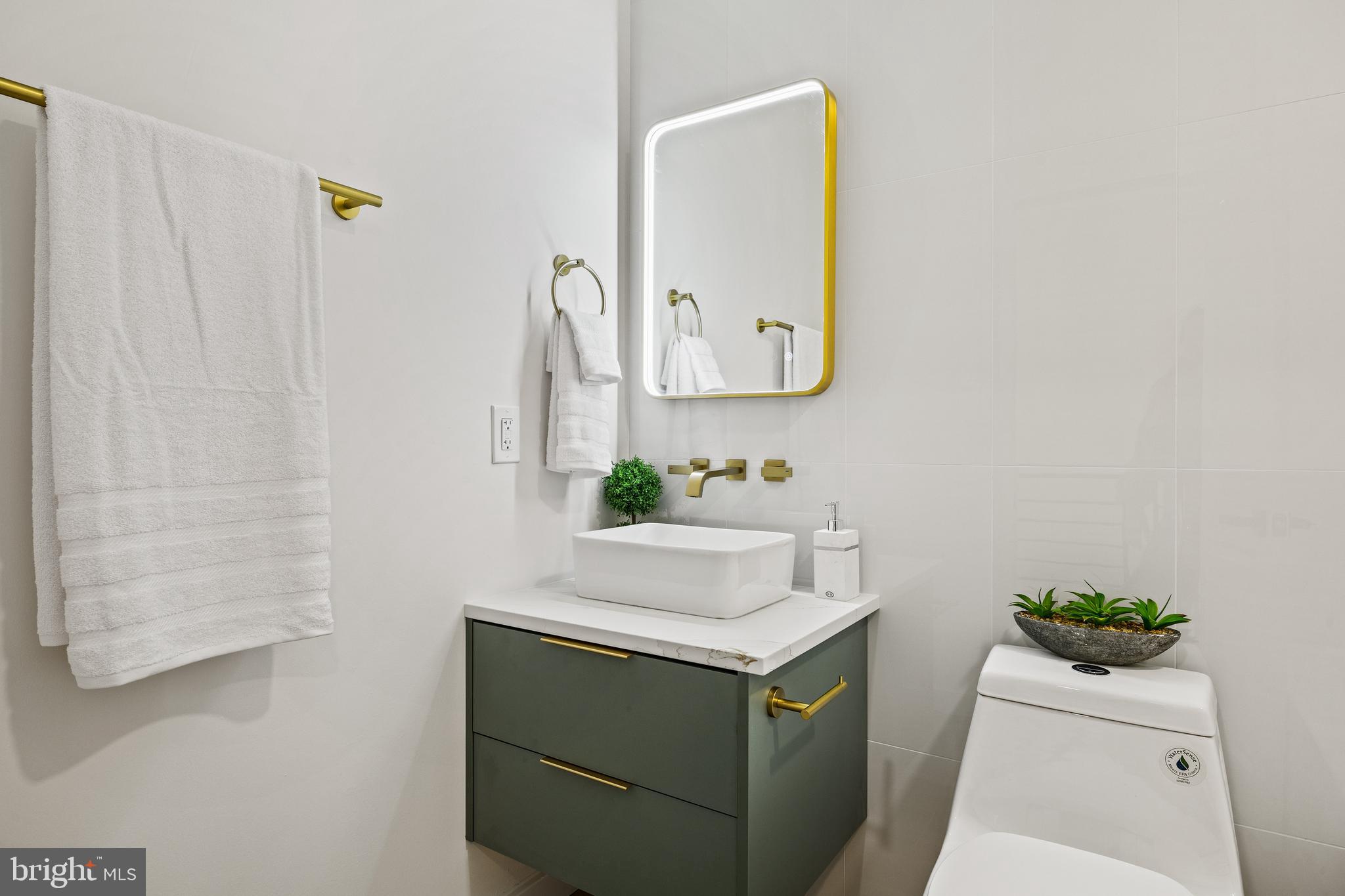 859 Selmer Road Philadelphia, PA 19116 - Photo 22 of 47 a bathroom with a sink and a mirror