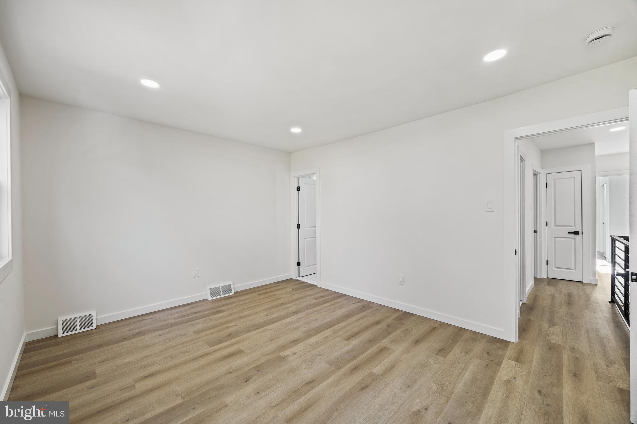 859 Selmer Road Philadelphia, PA 19116 - Photo 25 of 47 wooden floor in a room with a window