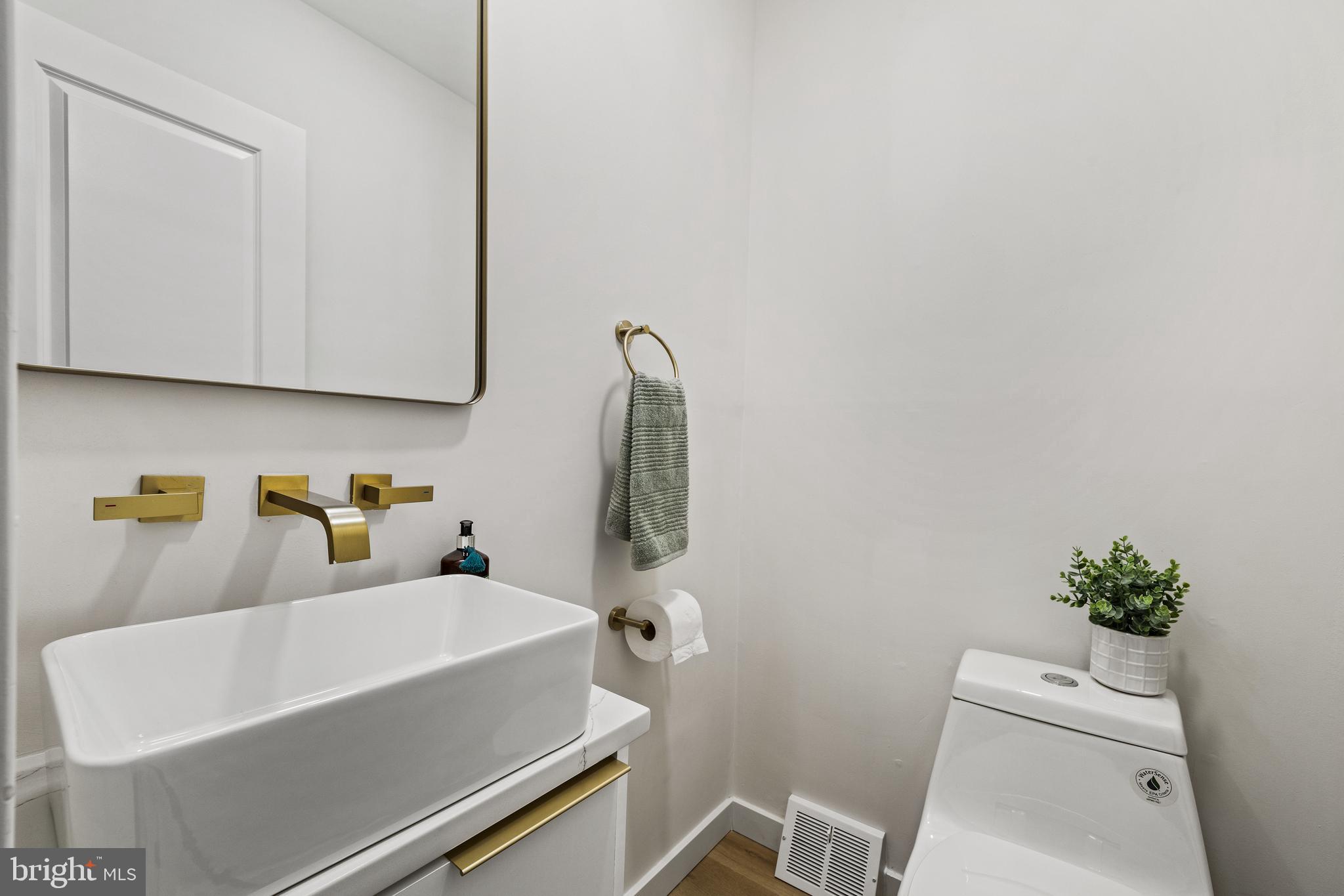 859 Selmer Road Philadelphia, PA 19116 - Photo 29 of 47 a bathroom with a sink and a toilet