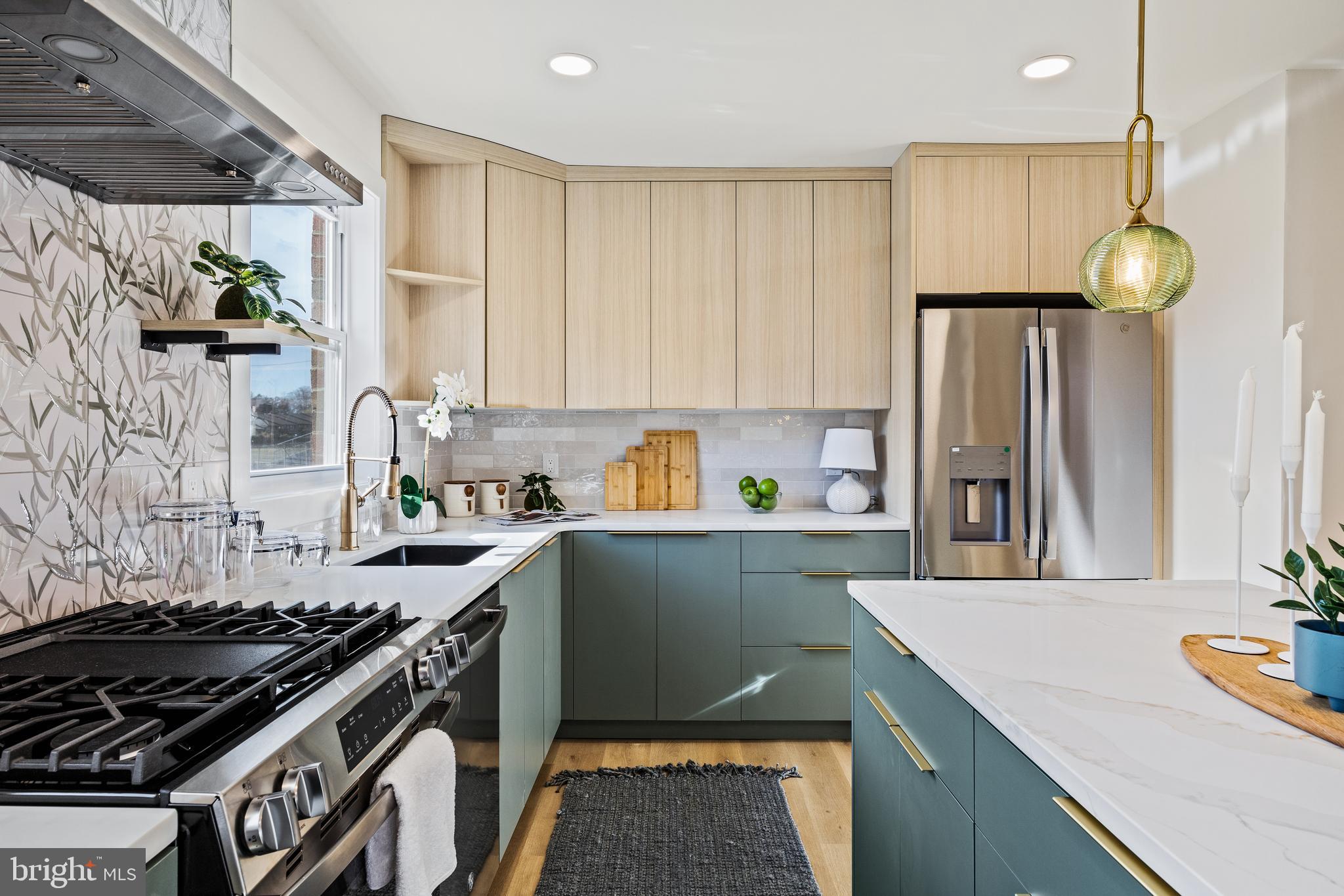 859 Selmer Road Philadelphia, PA 19116 - Photo 4 of 47 a kitchen with a cabinets and appliances