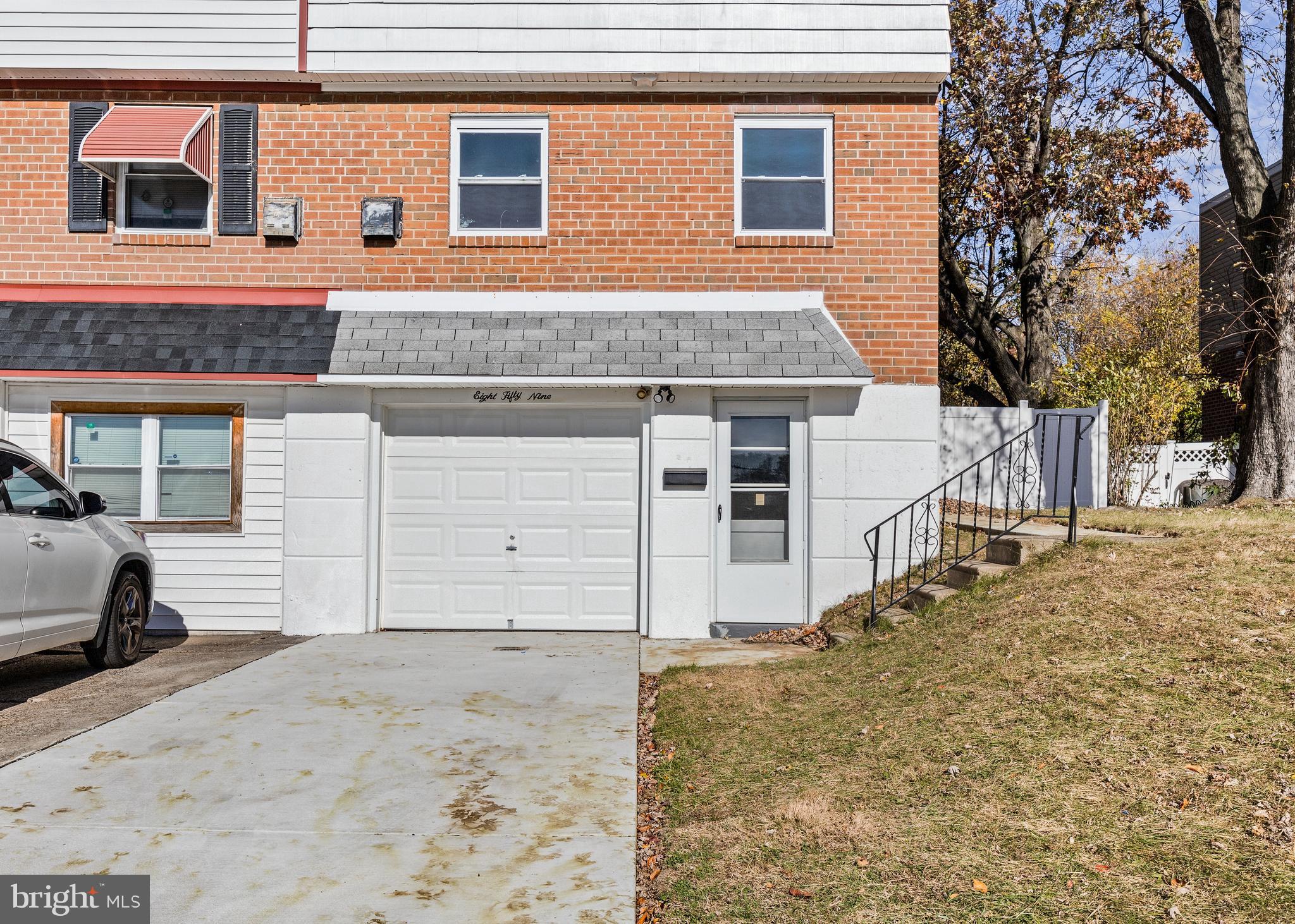 859 Selmer Road Philadelphia, PA 19116 - Photo 46 of 47 a front view of a house with a yard