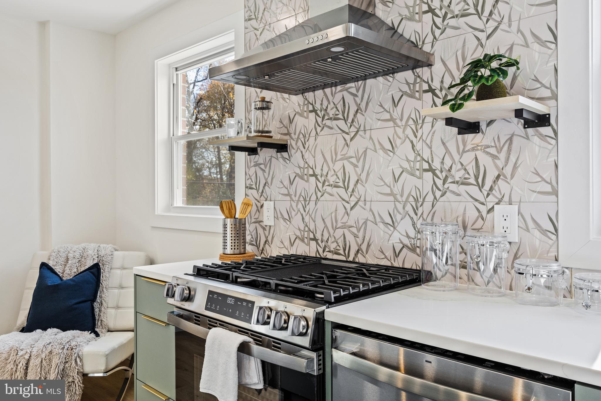 859 Selmer Road Philadelphia, PA 19116 - Photo 5 of 47 a stove top oven sitting inside of a kitchen