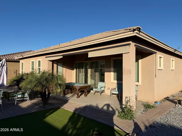 a view of house with patio outdoor seating