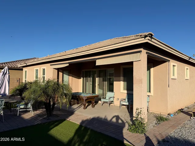 a view of house with patio outdoor seating