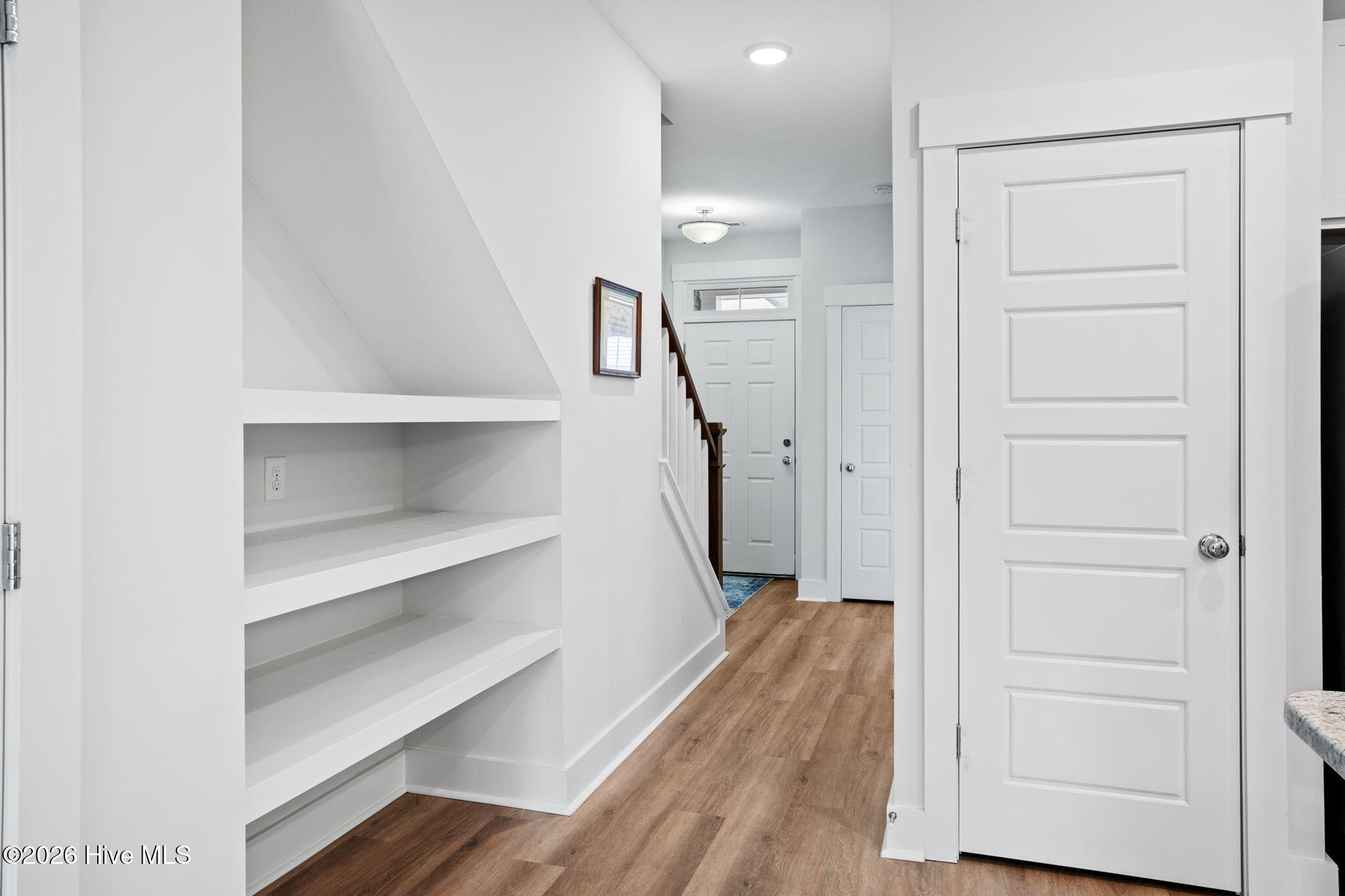 8239 Paramount Point Winnabow, NC 28479 - Photo 11 of 29 Downstairs Hallway