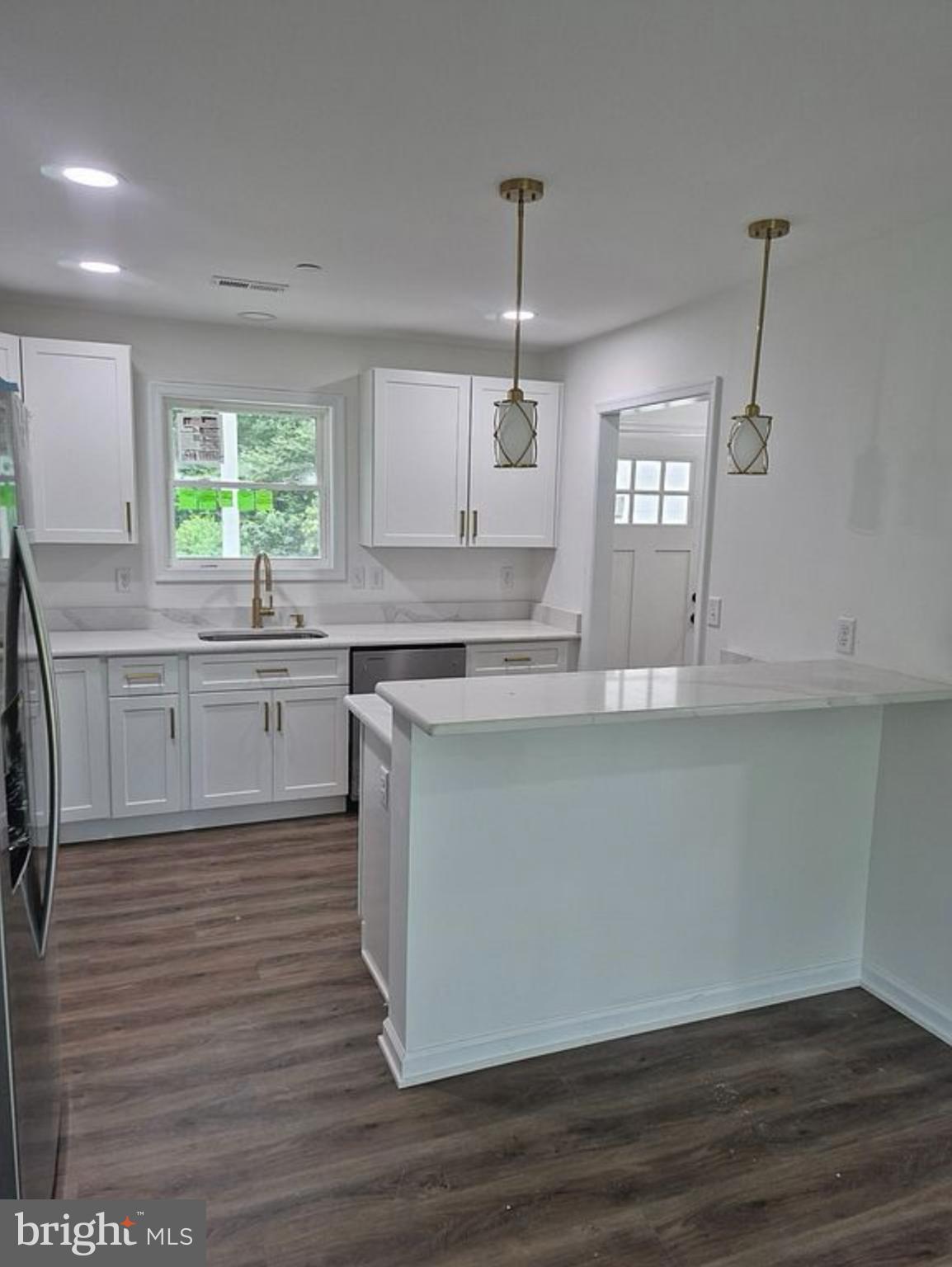 3345 Gallagher Road Preston, MD 21655 - Photo 4 of 9 Bright and modern kitchen with sleek finishes.