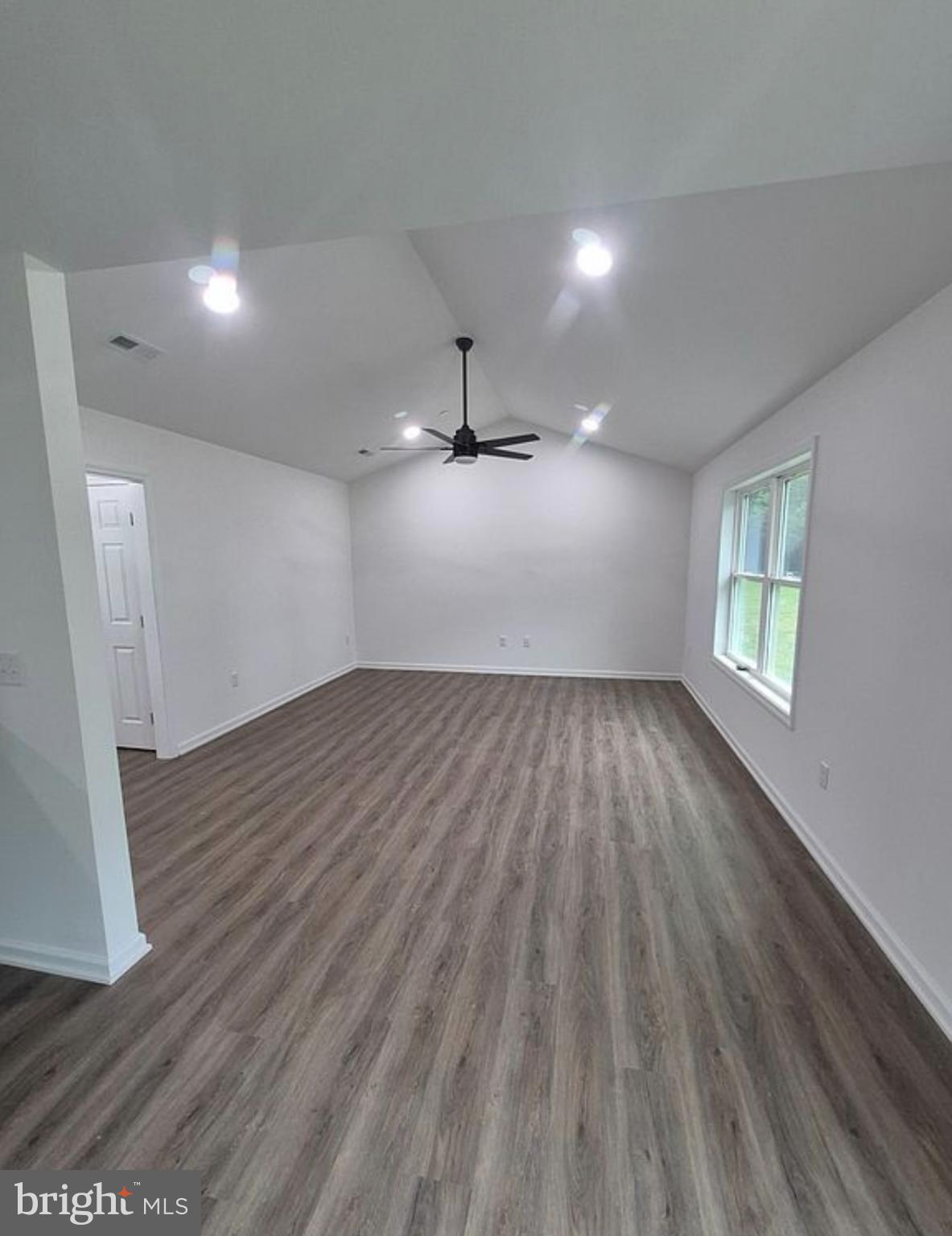 3345 Gallagher Road Preston, MD 21655 - Photo 5 of 9 Spacious room with modern design elements.
