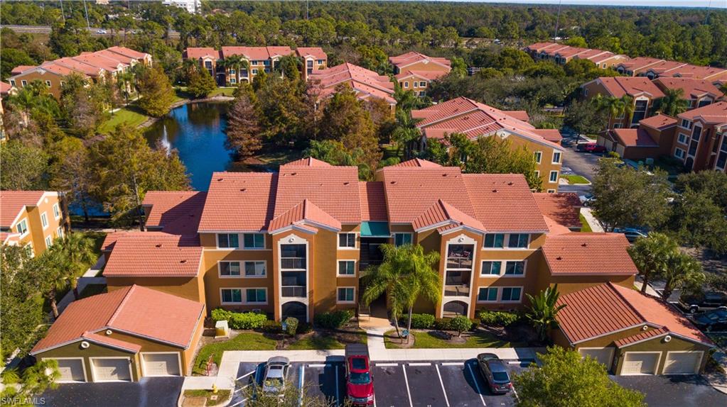 1160 Reserve Way, Unit 303 Naples, FL 34105 - Photo 14 of 19 an aerial view of residential houses and outdoor space