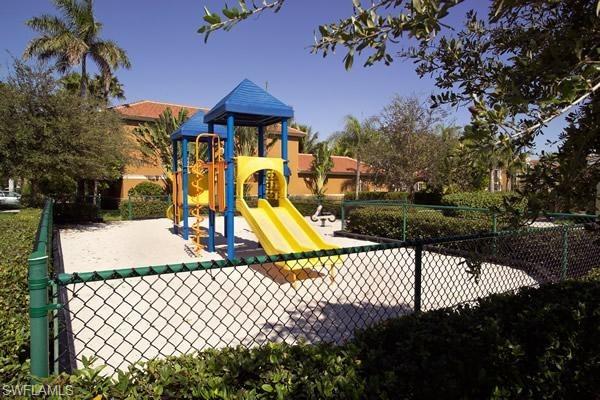 1160 Reserve Way, Unit 303 Naples, FL 34105 - Photo 18 of 19 a view of a park with slide