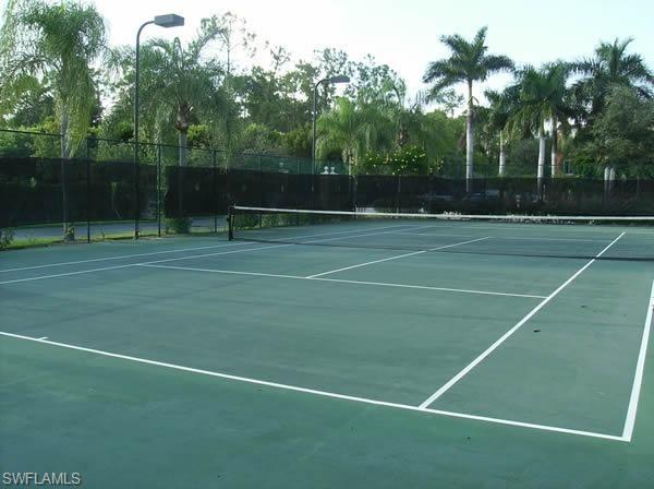 1160 Reserve Way, Unit 303 Naples, FL 34105 - Photo 19 of 19 a view of a tennis court